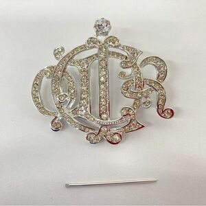 Christian Dior monogram crystal brooch